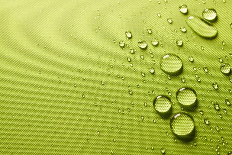Top,View,Of,Abstract,Green,Fabrics,With,Closeup,Transparent,Drops